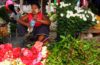 Woman selling flowers at the lake inle weekly markets