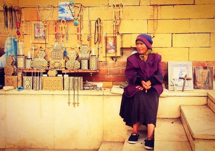 woman selling trinkets at coptic cairo
